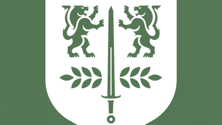 White PCC crest on green background